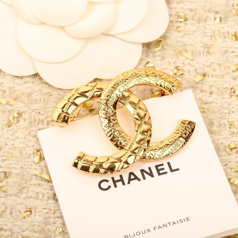 Ch**el brooches